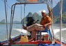Helmsman on the longtail boat
